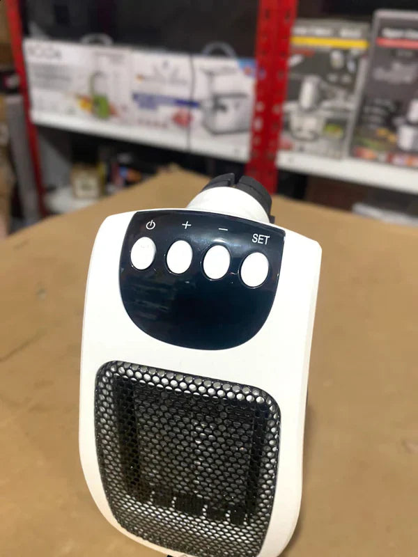 QUIGG Mini Plug-in Heater