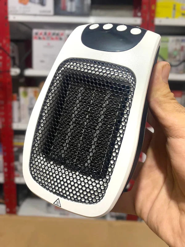 QUIGG Mini Plug-in Heater