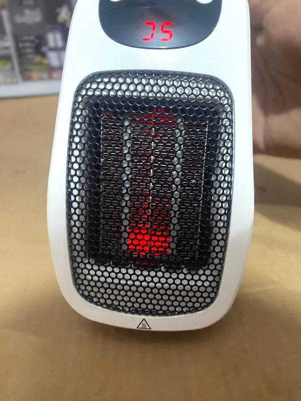 QUIGG Mini Plug-in Heater