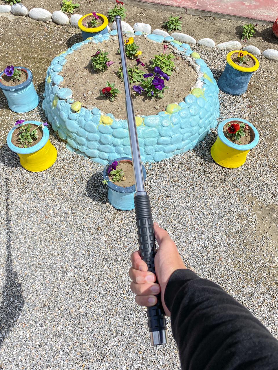 Automatic Tactical Baton